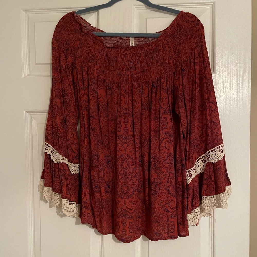 Off the shoulder ruffle sleeved top